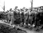 African-American US Army WAC Major Charity E. Adams and Captain Abbie N. Campbell inspecting WAC members of the 6888th Central Postal Directory Battalion, England, United Kingdom, 15 Feb 1945