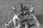 Japanese sailors at the bow of a ship, circa 1940s