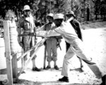 African-American US Army Lt. B. Holmes instructing bayonet combat, Fort McClellan, Alabama, United States, Nov 1942; trainees L to R: T/Sgt. Leroy Smith, Pvt. George W. Jones, and Sgt. Leo Shorty