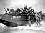 African-American US Navy Construction Battalion personnel performing an assault landing training exercise in the United States, Dec 1942