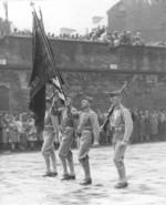 US Marines parading in Londonderry, Northern Ireland, United Kingdom in celebration of the first anniversary of USMC arrival, 1943