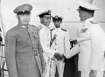 British Navy Vice Admiral Denis Boyd greeting Chinese Navy Rear Admiral Chou Sien Chang aboard HMS Belfast, Nanjing, China, 1945-1947