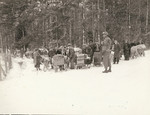 US 7th Army military policemen watching over a group of refugees, 1944-1945