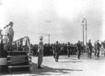 Japanese-American troops of US 442nd Regimental Combat Team marching at a review, Livorno, Italy, Sep 1945, photo 2 of 2