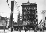 A street corner on Unter den Linden in Berlin, Germany during the 1936 Summer Olympic Games, 21 Jun 1936