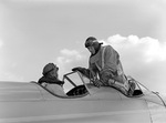 Norwegian airmen in a training aircraft at Flyvåpnenes Treningsleir, 