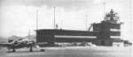 SNB Expeditor sitting in frot of the control tower at Marine Corps Air Station Ewa, US Territory of Hawaii, 1940s