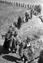 German prisoners of war being marched across a field, Odessa Oblast, Ukraine, 10 Apr 1944