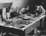 USAAF men working on aerial reconnaissance photographs, Saipan, Mariana Islands, 1945, photo 2 of 4