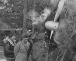 Claire Chennault inspecting camouflaged aircraft, China, 15 Feb 1943