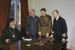 Archbishop Damaskinos with Lieutenant Colonel K. Vassilikopoulos, Lieutenant Commander S. Boudouris, and Wing Commander B. Angelopoulos, Athens, Greece, 15 Feb 1945