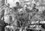 Finnish Army Lieutenant General Erik Heindrichs, Colonel Ruben Lagus, and Major General Paavo Talvela in discussion in the field, Finland, summer 1941