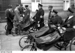 Rudolf Heß speaking with disabled German Army veterans at the courtyard of his Wilhelmstrasse office, Berlin, Germany, 5 Jan 1936