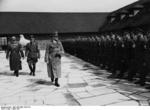 Hitler visiting the Ordensburg Vogelsang school in North Rhine-Westphalia, Germany, 29 Apr 1937, photo 2 of 2; Dr. Robert Ley seen with Hitler