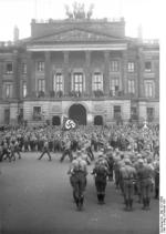 Adolf Hitler reviewing a Nazi Party rally, Braunschweig, Germany, Feb 1931, photo 1 of 2