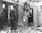 General Douglas MacArthur and Colonel James Corbett at the ruins of the Manila Hotel, Manila, Philippine Islands, 23 Feb 1945