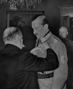 Finnish President Kyösti Kallio decorating Field Marshal Carl Gustaf Emil Mannerheim with the Order of the Cross of Liberty, Helsinki, Finland, 16 May 1940