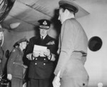 Louis Mountbatten reading a dispatch, Berlin-Gatow airfield, Berlin, Germany, 24 Jul 1945