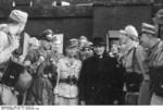 Otto Skorzeny, Harald Mors, and Benito Mussolini in front of Hotel Campo Imperatore, Gran Sasso, Italy, 12 Sep 1943, photo 4 of 4