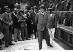 Heinrich Brüning, Benito Mussolini, and Luca Orsini Baroni at Villa d