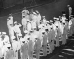 Nimitz shaking hands with officers at the Pearl Harbor Submarine Base, US Territory of Hawaii, 31 Dec 1941