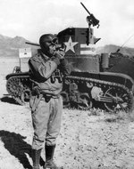 George Patton next to a M3 light tank, possibly in California, United States, 1942