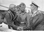 German Colonel Manhnke shaking hands with Hanna Reitsch, the only female competitor at the glider competition in the Rhön mountains region of Germany, 27 Aug 1936