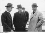 British Prime Minister Neville Chamberlain, German Foreign Minister Joachim von Ribbentrop, and British journalist Ward Price at Lake Chiemsee, Germany, 16 Sep 1938; note British Ambassador to Berlin Nevile Henderson in background