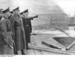 Field Marshal Erwin Rommel inspecting a submarine pen with General Wilhelm Fahrmbacher and Commander Ernst Kellermann, St. Nazaire, France, 18 Feb 1944