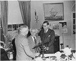 Israeli Prime Minister David Ben-Gurion presenting US President Harry Truman with a Menorah, White House, Washington DC, United States, 8 May 1951; Israeli Ambassador to US Abba Eban also present