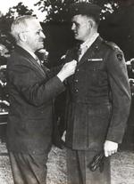 Harry Truman awarding the Medal of Honor to Major Louis H. Wilson, Jr., USMC on the lawn of the White House, Washington DC, United States, 5 Oct 1945