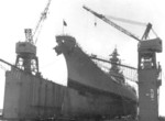 USS Wisconsin in floating drydock ABSD-1 in Apra Harbor, Guam, 5 Apr 1952.