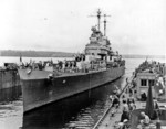 USS ABSD-1 with USS Columbia in the dock, Espiritu Santo, New Hebrides, Jan 1944