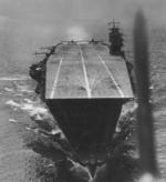 Flight deck of Akagi as seen from an aircraft that just took off from the carrier, Indian Ocean, Apr 1942; note D3A Type 99 dive bombers preparing for takeoff on the flight deck