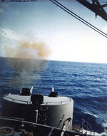 Alaska fired her 5-inch gun during gunnery practice, 5 Feb 1945