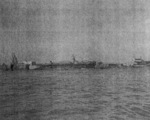 USS Anzio at anchor in the Huangpu River, Shanghai, China, Dec 1945