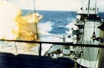 Battleship Colorado firing her after 16-in guns at Japanese positions at Tarawa Atoll, Gilbert Islands, late Nov 1943; note crewmen were not in battle dress, so photo might be taken during practice