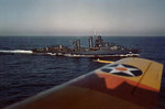 Drayton uderway at sea, off the west coast of the United States, circa Oct 1941; note starboard wing of US Navy SNJ aircraft from which the photo was taken