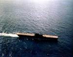 USS Enterprise in the Pacific turning into the wind to recover aircraft, late June 1941 before her natural wood flight deck was stained blue in July 1941.