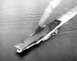 Essex underway at sea during the Okinawa Campaign, 20 May 1945; note the F4U and F6F aircraft on the flight deck