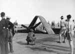 Corsair fighter in an elevator aboard HMS Glory, off Rabaul, New Britain, 6 Sep 1945, photo 2 of 2