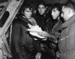 Rescued survivors of USS Helena aboard destroyer USS Nicholas, Solomon Islands, 6 Jul 1943. Photo 1 of 2.