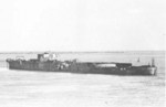 The recovered hull of Impero moored off Venice, Italy, awaiting scrapping, summer 1948