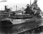 Battleship Indiana at Pearl Harbor Navy Yard, US Territory of Hawaii, 13 Feb 1944, photo 2 of 4; note damage from collision with Washington