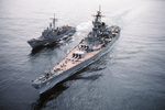 Guided missile frigate USS Halyburton receiving fuel from battleship USS Iowa in the North Atlantic, 6 Sep 1985, photo 2 of 5