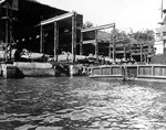 Koryu Type D submarines in an assembly shed at the Mitsubishi shipyard, Nagasaki, Japan, circa Sep 1945, photo 1 of 2