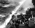 Japanese special attack Zero fighter crashing into USS Missouri, off Okinawa, Japan, 11 April 1945