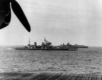 HMS King George V, USS Missouri, a British destroyer, and an American Essex-class carrier at sea off Japan, 16 Aug 1945