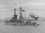 USS Nevada with a kite balloon moored to her after deck, Guantánamo Bay, Cuba, 1 Mar 1919