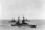 USS Nevada (foreground), USS Oklahoma (center), and either USS Pennsylvania or USS Arizona (background) underway, early 1920s